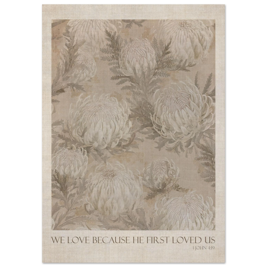 Vintage botanical floral art print in soft natural tones with the quote 'WE LOVE BECAUSE HE FIRST LOVED US'
