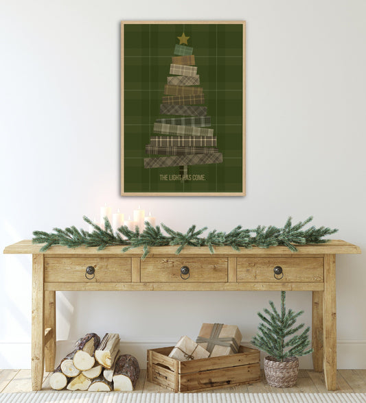 THE LIGHT HAS COME scripted below  Christmas tree abstracted with a dark green tartan background   Digital Download poster