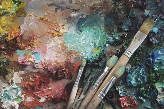 An image of an artist pallet with oil paints