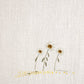soft delicate natural look  flowers on off white linen look background with theme of faith, hope and love